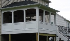 An Elevated Outdoor Deck With a Roof